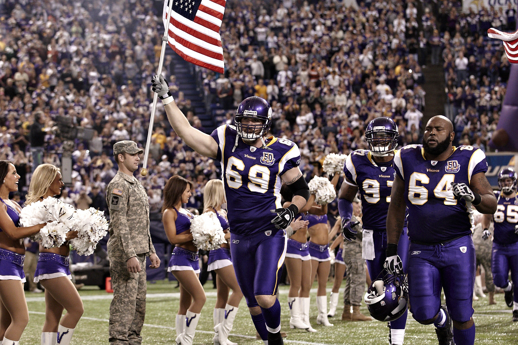 Vikings' Jared Allen carried an American flag onto Mall of America Field to  honor servicemen and women on Veterans' Day Sunday, November 11, 2012, in  Minneapolis, Minnesota. The Minnesota Vikings defeated the